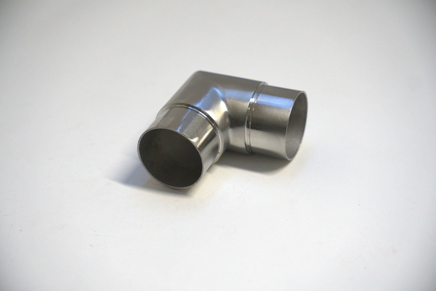 Round handrail connector from Best Glass Parts, designed for 90-degree glass railing installations, shown in the image.