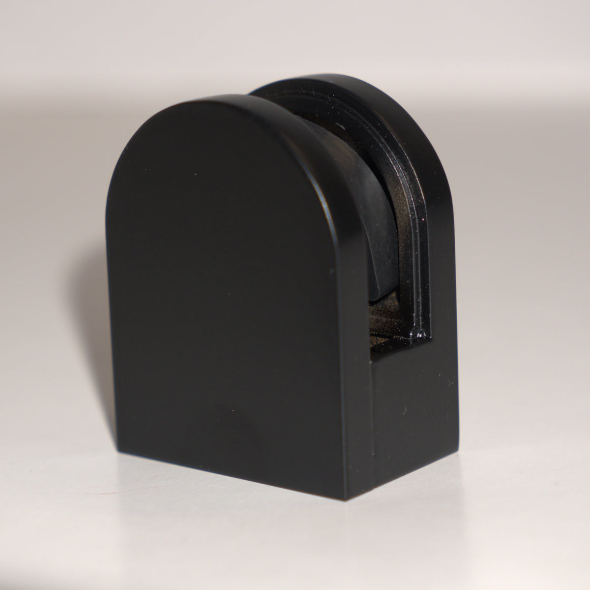 Black round base clamp for 8mm to 10mm glass, designed by Best Glass Parts, showing the clamp's smooth round shape and secure fit.