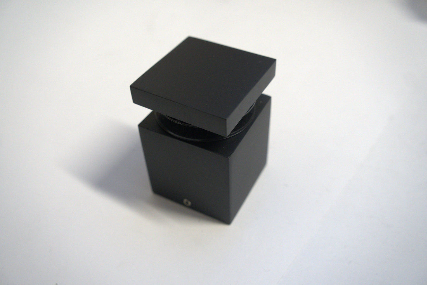 Square stand-off 2x2 inches from Best Glass Parts, featuring a metal finish and mounting holes for glass or panel installation.