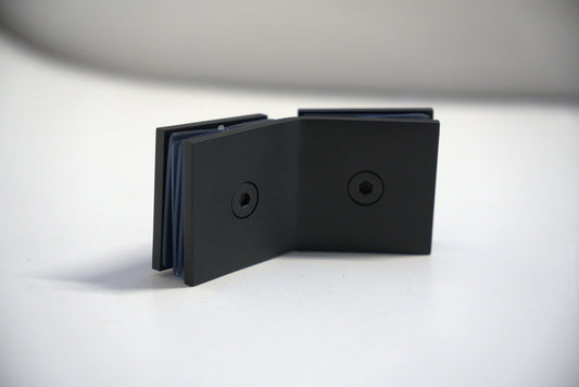 Glass to glass clamp 135 from Best Glass Parts, showing a metal clamp with screws for securing glass panels.