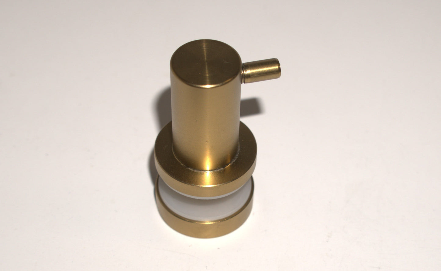 Best Glass Parts knob robe hook mounted on a wall, illustrating its sleek design and sturdy metal construction for bathroom or closet use.