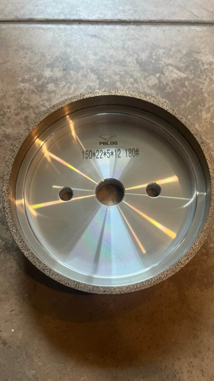 Close-up of a diamond wheel from Best Glass Parts, showing the textured grinding surface for glass cutting and polishing.