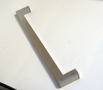 Chrome square towel bar from Best Glass Parts, mounted on a bathroom wall with a sleek, modern design.