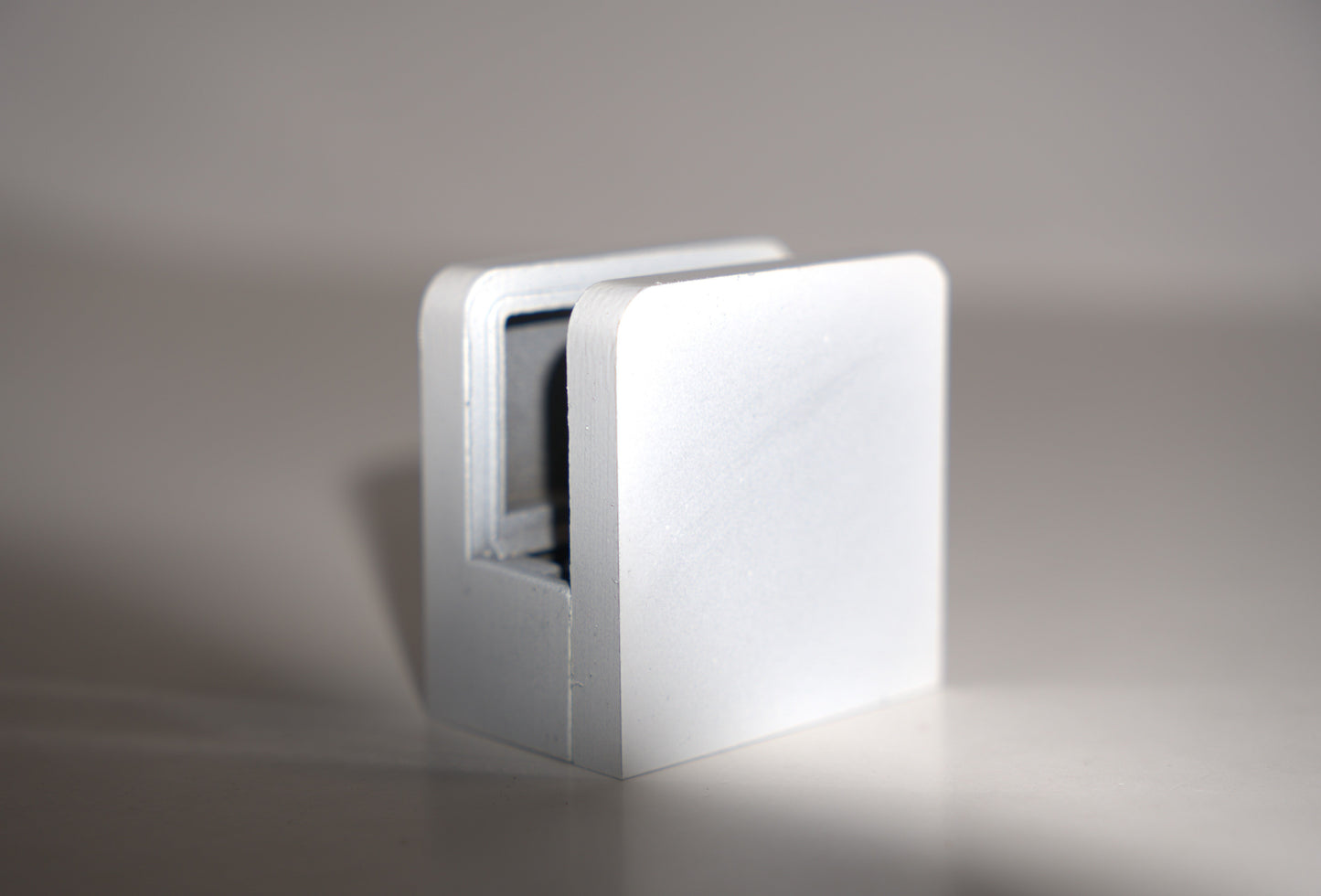 Small 45mm flat base clamp from Best Glass Parts, showing its sturdy metal construction and flat mounting surface.