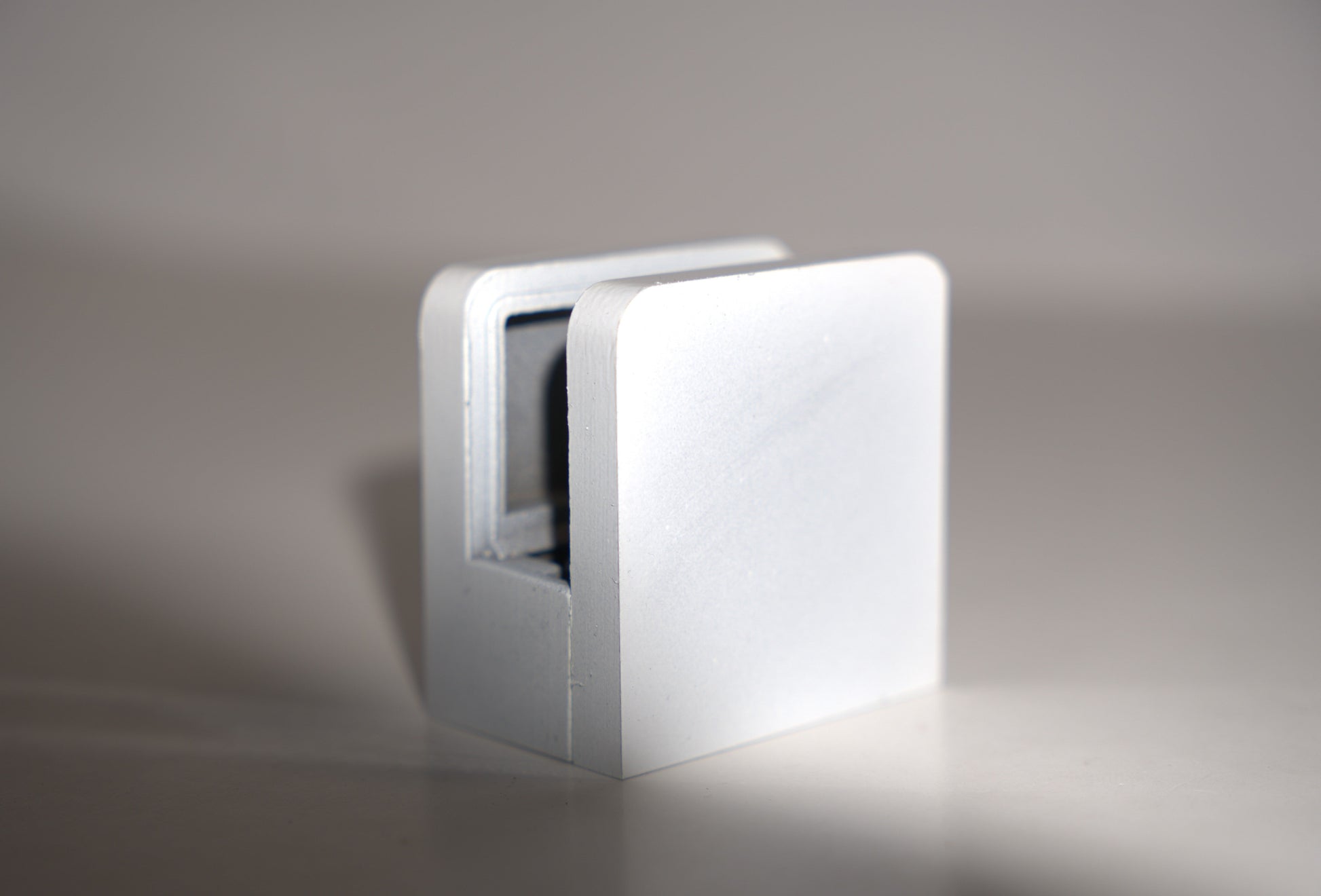 Small 45mm flat base clamp from Best Glass Parts, showing its sturdy metal construction and flat mounting surface.