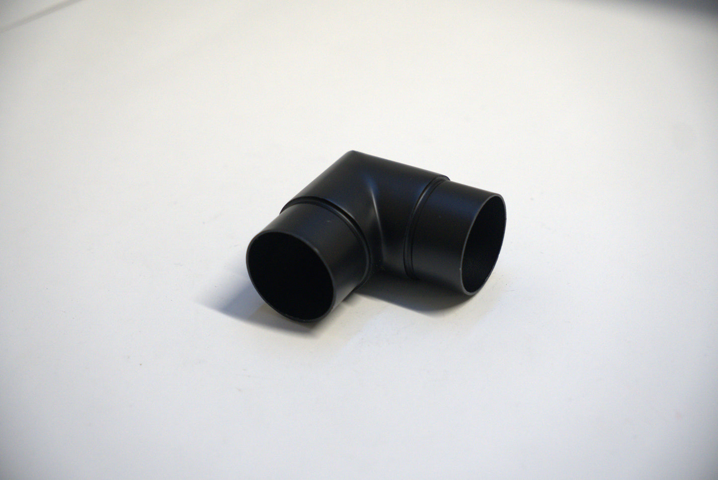 Round handrail connector from Best Glass Parts, designed for 90-degree glass railing installations, shown in the image.