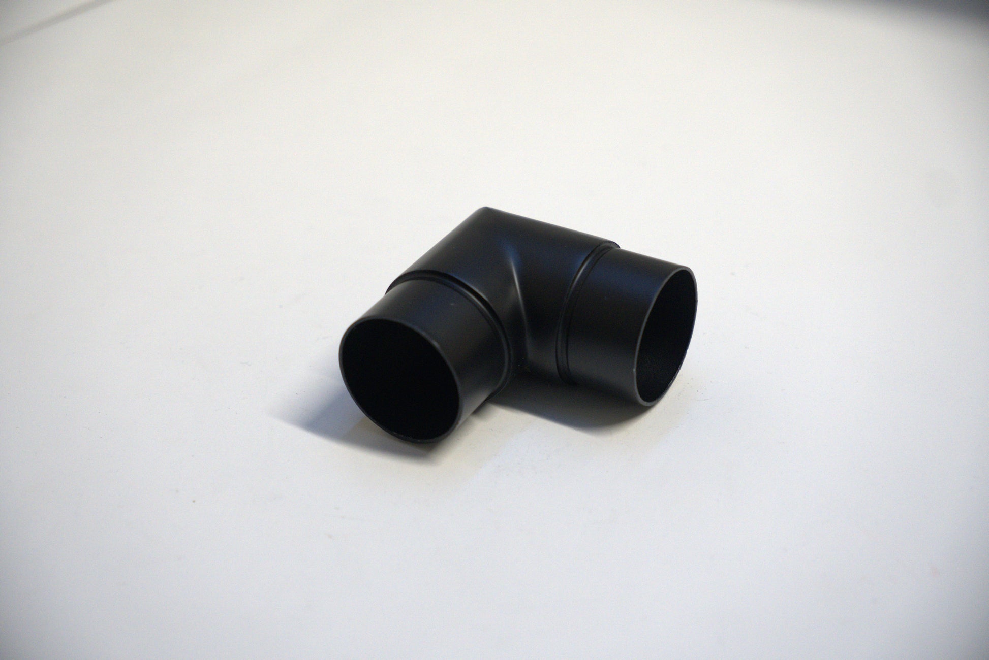 Round handrail connector from Best Glass Parts, designed for 90-degree glass railing installations, shown in the image.