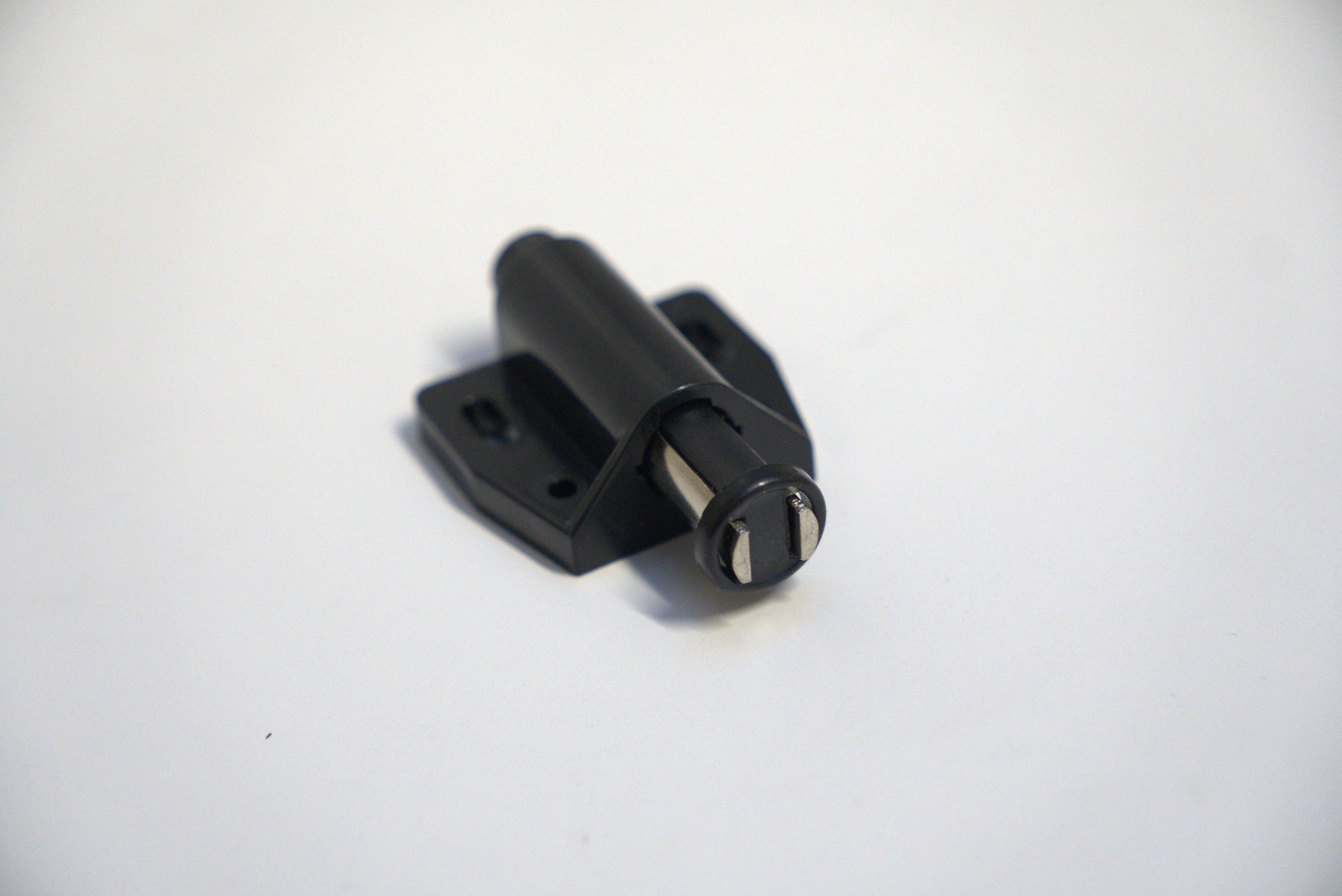 Showcase push to open single magnet from Best Glass Parts, featuring a sleek magnetic hardware component for glass display cases.