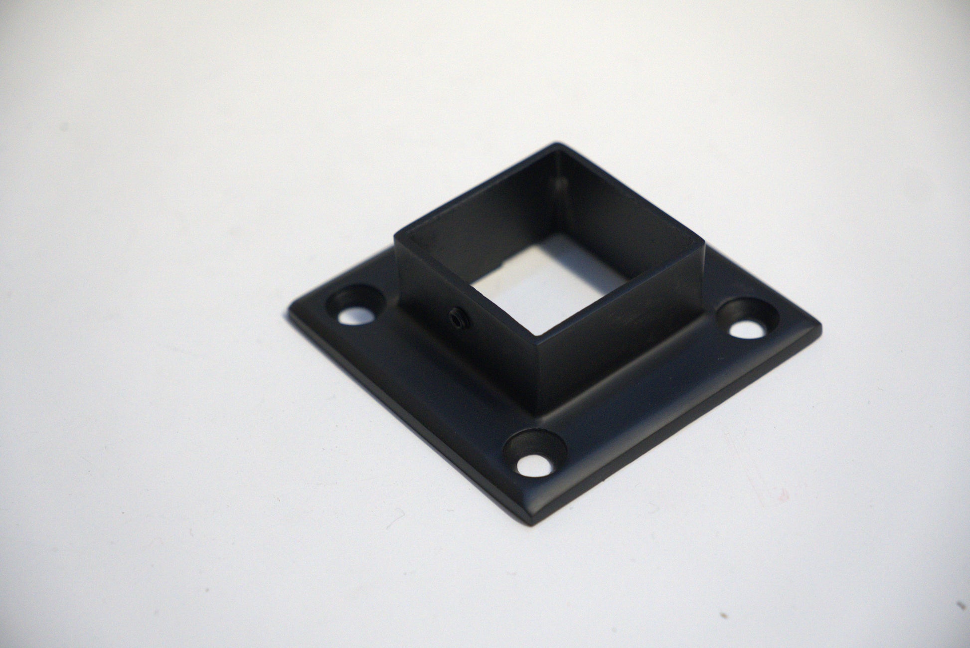 Square base side mount flange from Best Glass Parts, featuring a sturdy metal construction for glass installation.