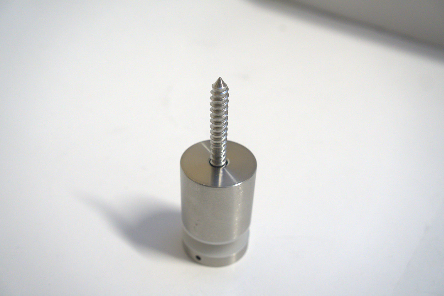 Stand Off Fix from Best Glass Parts, metal mounting hardware for glass installations, shown in a close-up image.
