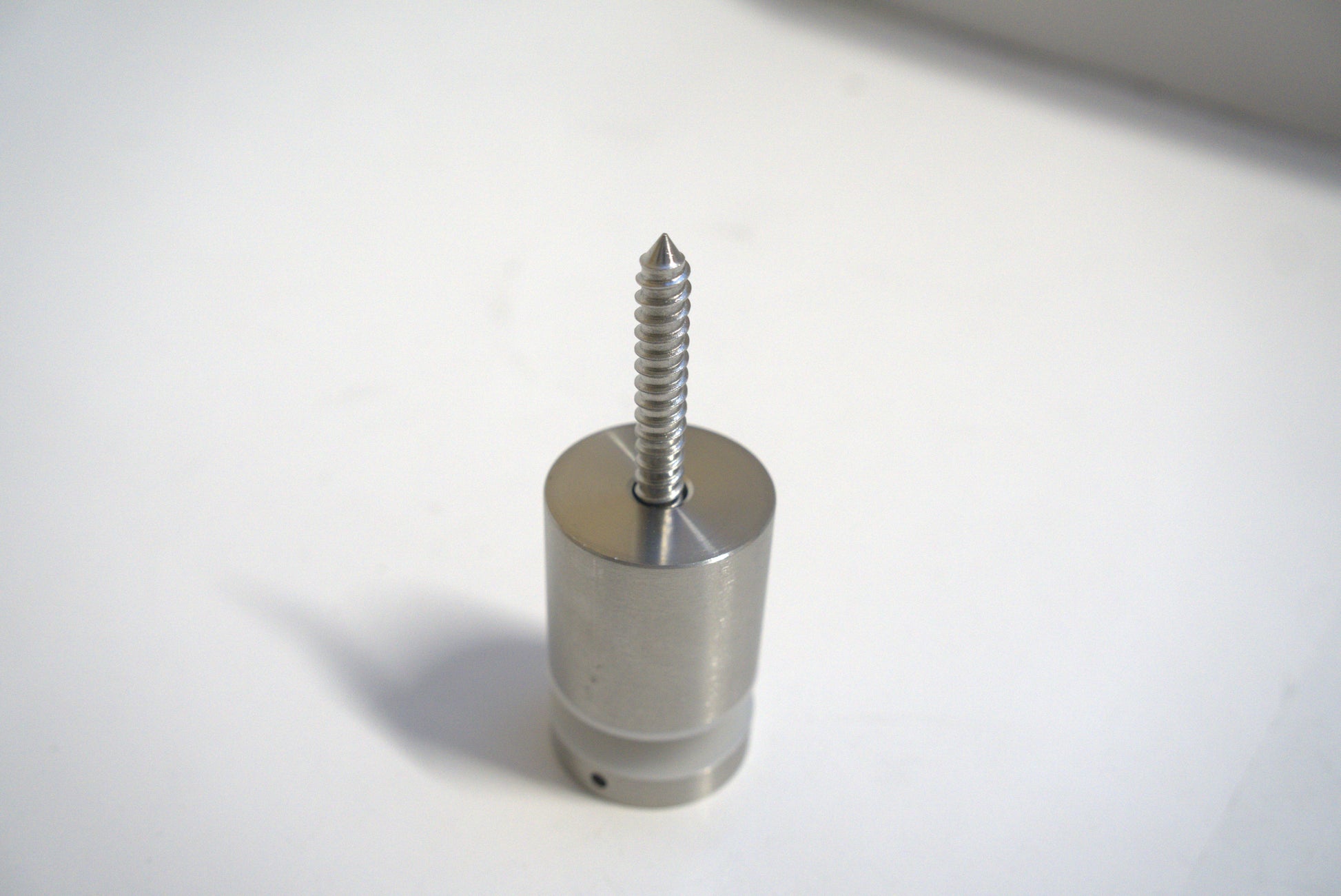 Stand Off Fix from Best Glass Parts, metal mounting hardware for glass installations, shown in a close-up image.