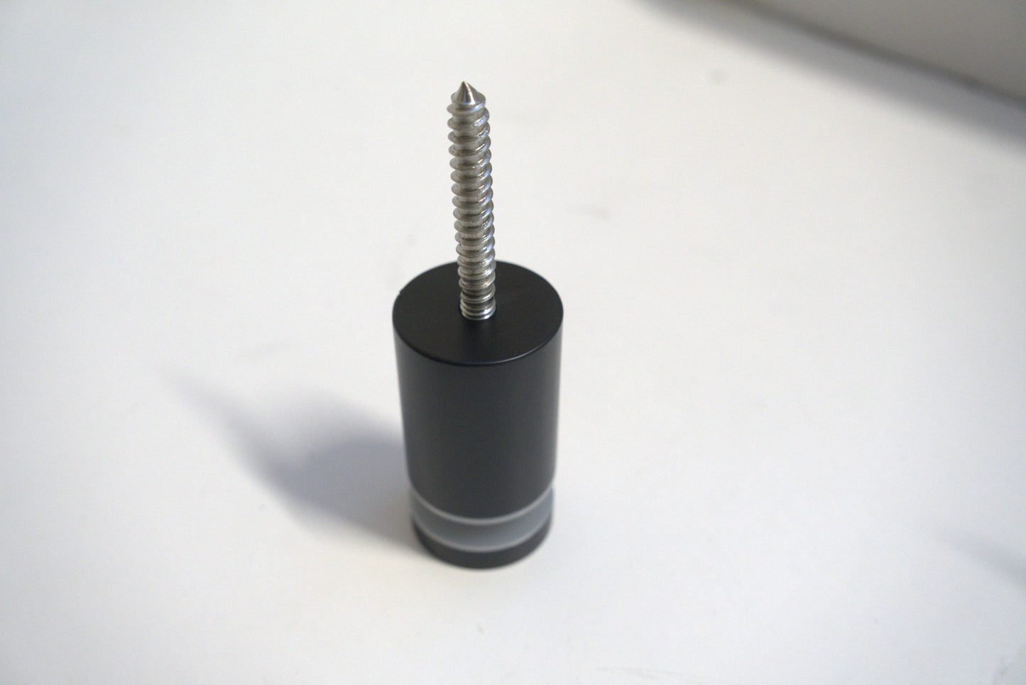 Best Glass Parts stand off fix showing metal spacer and mounting hardware for glass installation or repair.