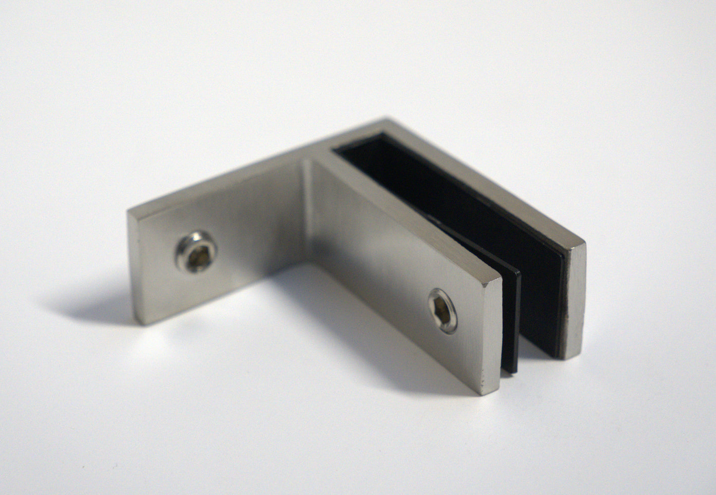 Mid-section F-type clamp from Best Glass Parts securing railing to wall and glass for sturdy glass railing installation.