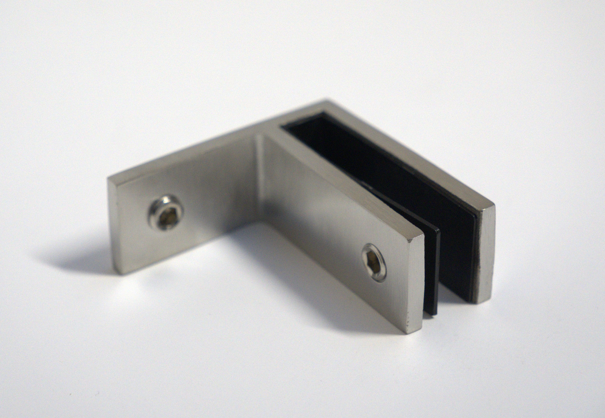 Mid-section F-type clamp from Best Glass Parts securing railing to wall and glass for sturdy glass railing installation.