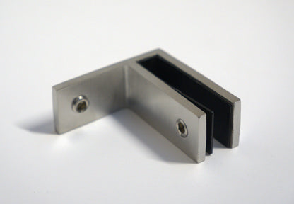 Mid-section F-type clamp from Best Glass Parts securing railing to wall and glass for sturdy glass railing installation.