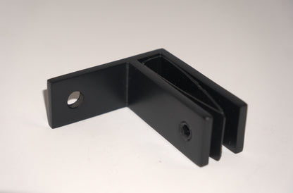 Railing Middle F Type Clamp from Best Glass Parts securing wall to glass railing system, with metal construction and mounting hardware visible.