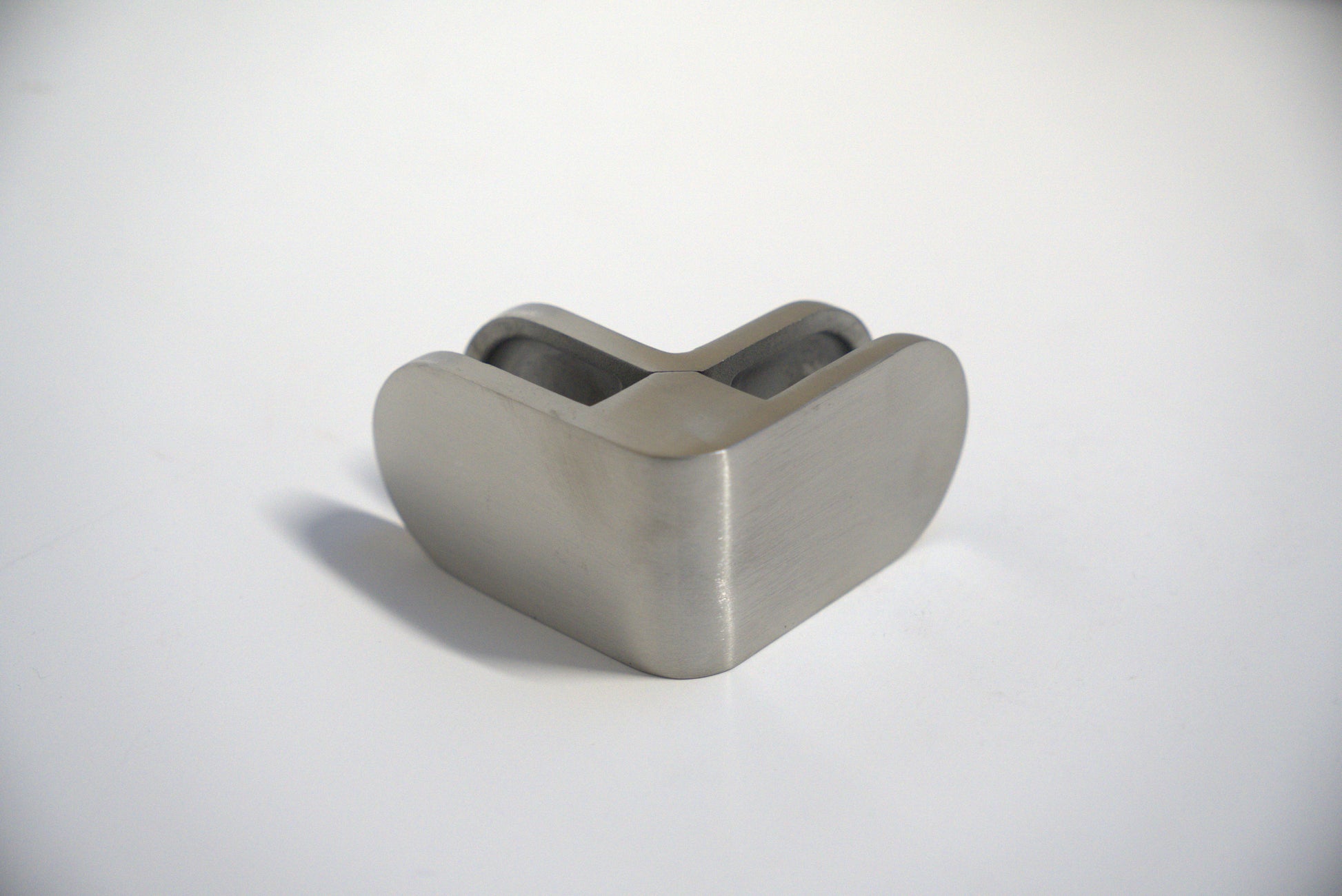 Round 90-degree glass railing middle clamp by Best Glass Parts, designed for securing glass panels in railing systems.