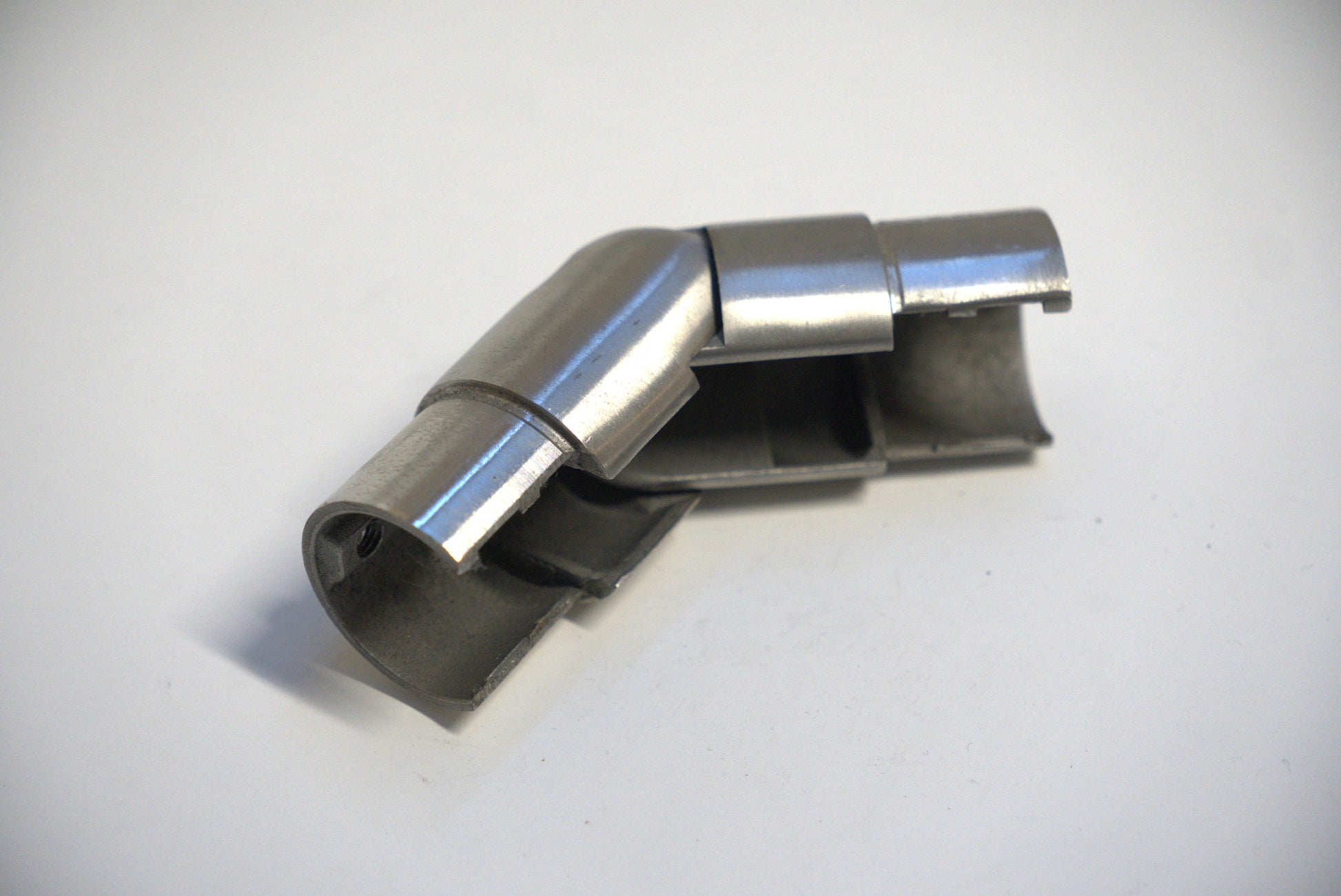 Round exterior railing top handrail by Best Glass Parts, showing its smooth, polished surface and mounting details.