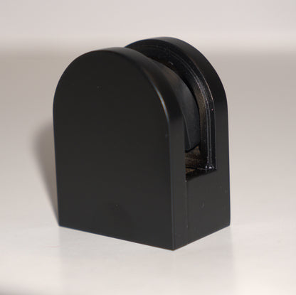 Black round base clamp for 8mm to 10mm glass, designed by Best Glass Parts, showing the clamp's smooth round shape and secure fit.