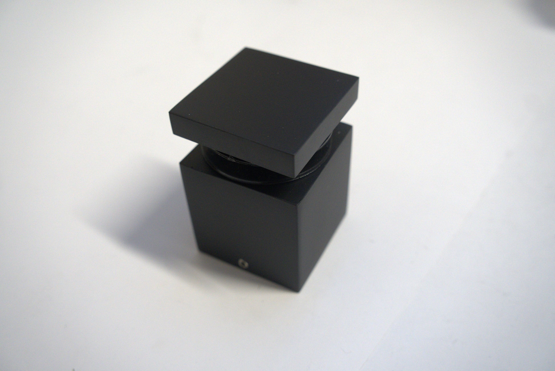 Square stand-off 2x2 inches from Best Glass Parts, featuring a metal finish and mounting holes for glass or panel installation.