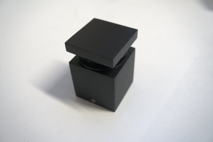 Square stand-off 2x2 inches from Best Glass Parts, featuring a metal finish and mounting holes for glass or panel installation.