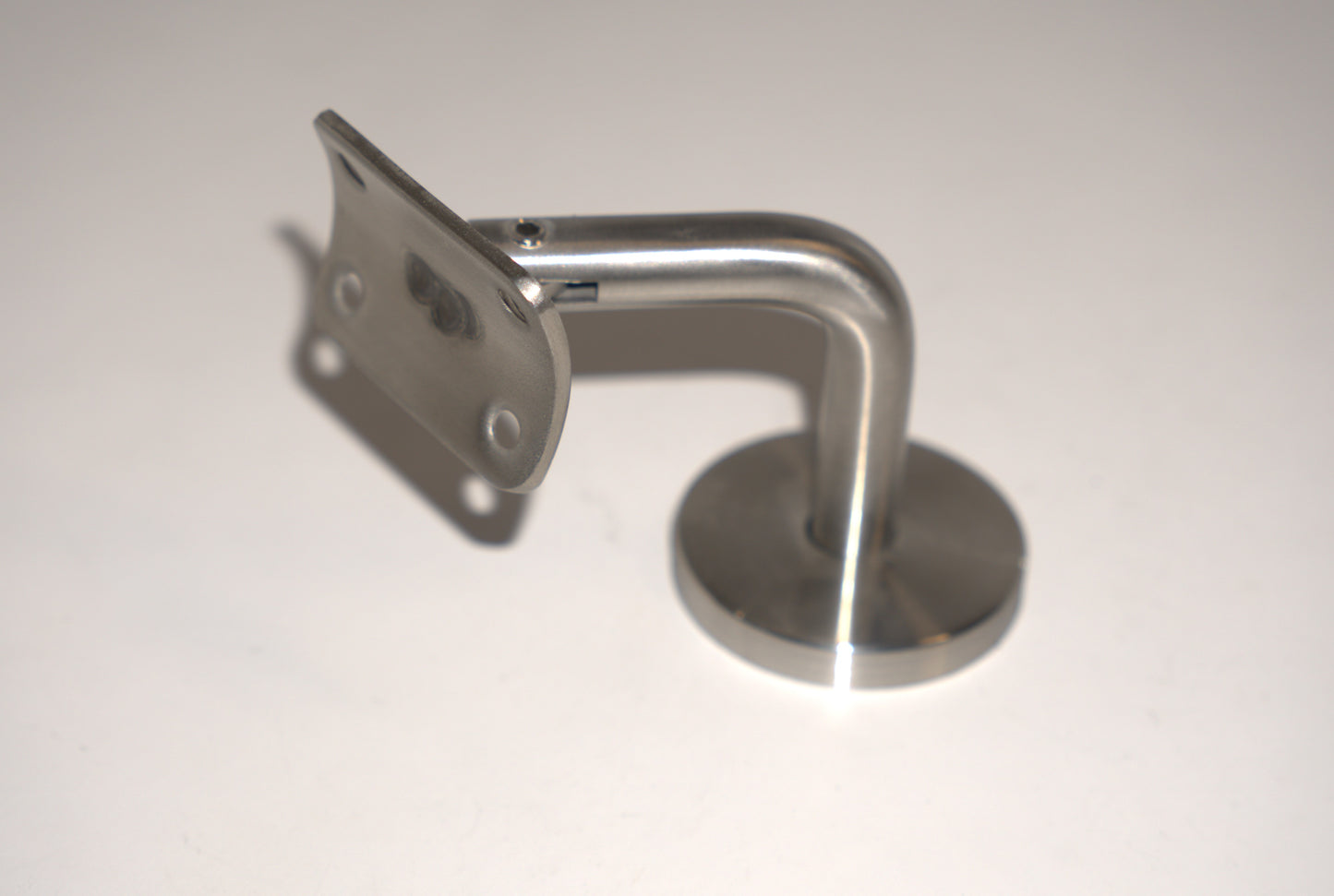 Round wall to handrail bracket by Best Glass Parts, showing a sturdy metal support for glass railings.