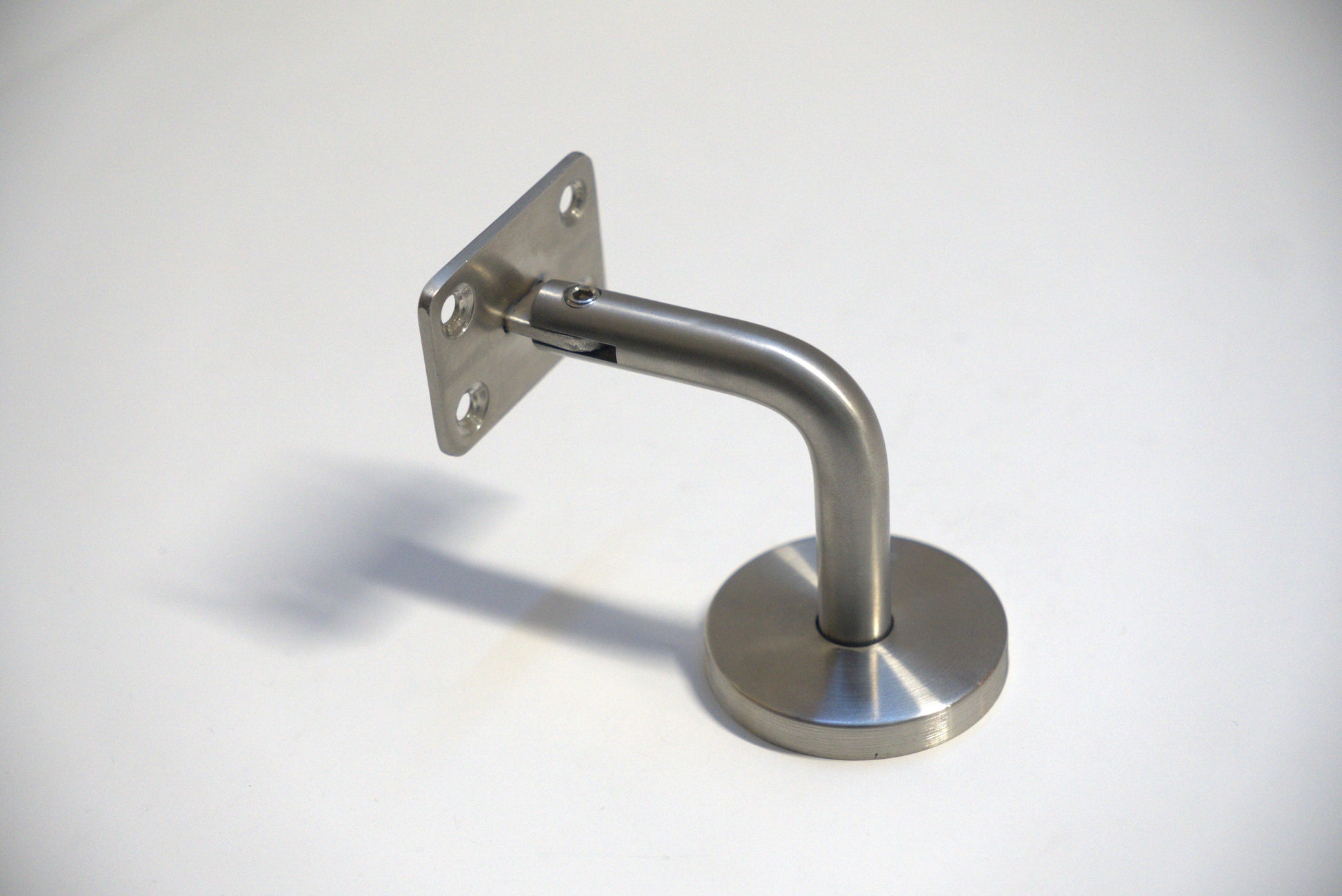 Square wall to handrail bracket by Best Glass Parts, showing a sleek metal bracket attached to a wall for handrail support.