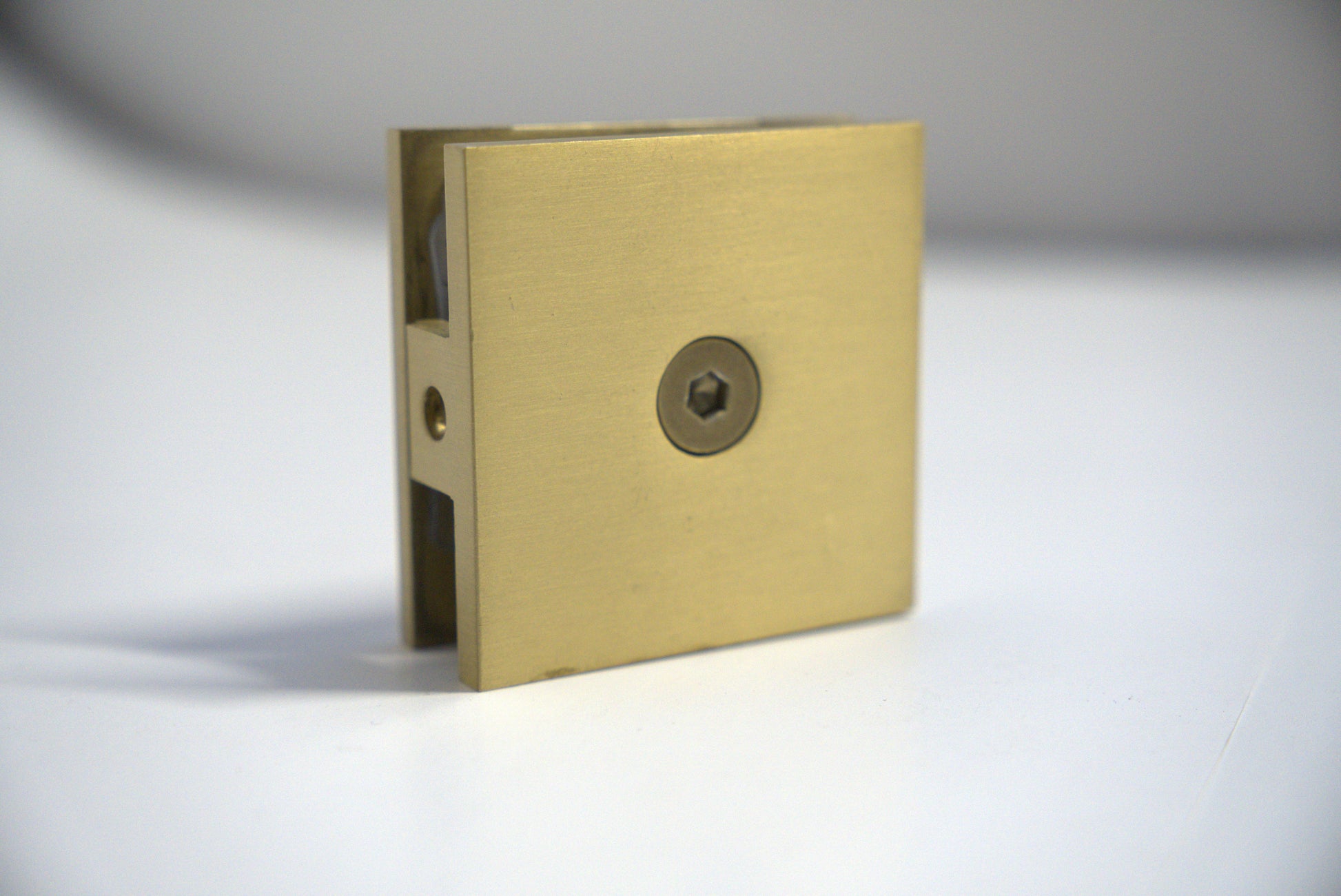 Chrome wall-to-glass clamp from Best Glass Parts, 50mm size, securing glass panels with a sleek, modern design.