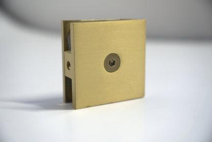 Chrome wall-to-glass clamp from Best Glass Parts, 50mm size, securing glass panels with a sleek, modern design.