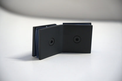 Glass to glass clamp 135 from Best Glass Parts, showing a metal clamp with screws for securing glass panels.