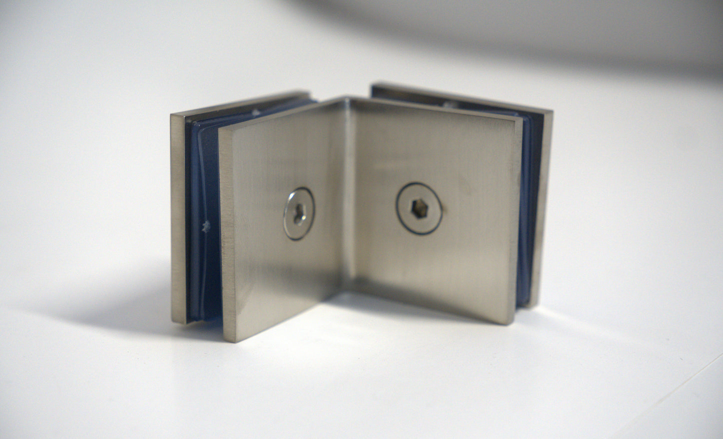 Glass to glass clamp 90 from Best Glass Parts, showing a sturdy metal clamp used for securing glass panels in installations.