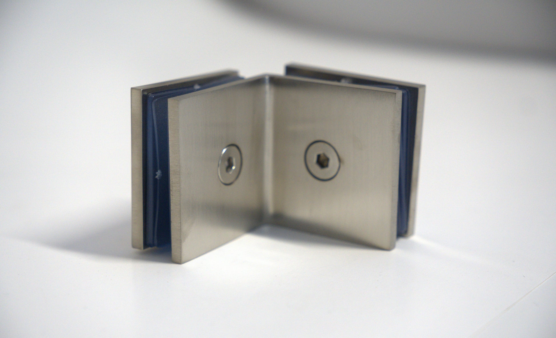 Glass to glass clamp 90 from Best Glass Parts, showing a sturdy metal clamp used for securing glass panels in installations.
