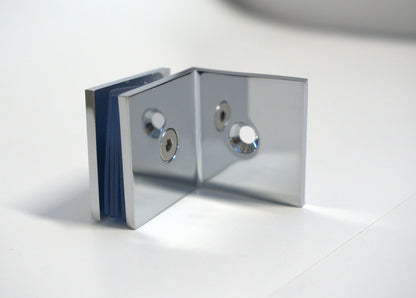 Glass to wall clamp at 90 degrees by Best Glass Parts, showing a clear metal fitting for securing glass panels.