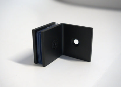 Glass to wall clamp at 90 degrees by Best Glass Parts, showcasing stainless steel construction securing glass panels at a right angle.