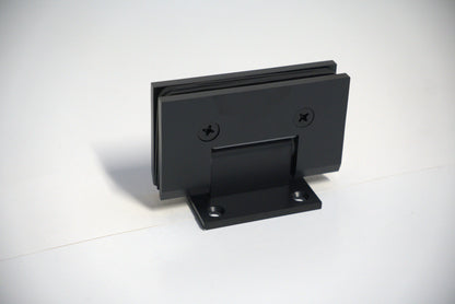Heavy-duty VEN wall-to-glass S plate hinge by Best Glass Parts, showing the sturdy metal hinge mounted on a glass panel.