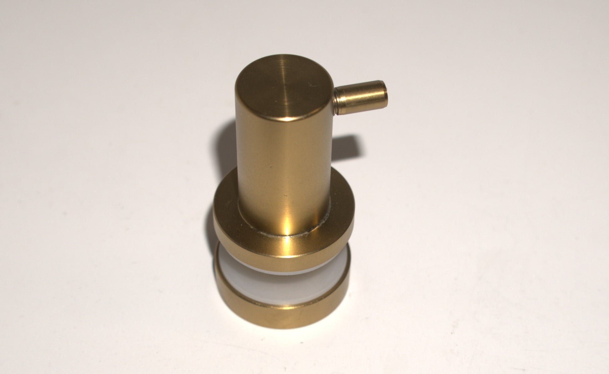 Best Glass Parts knob robe hook mounted on a wall, illustrating its sleek design and sturdy metal construction for bathroom or closet use.