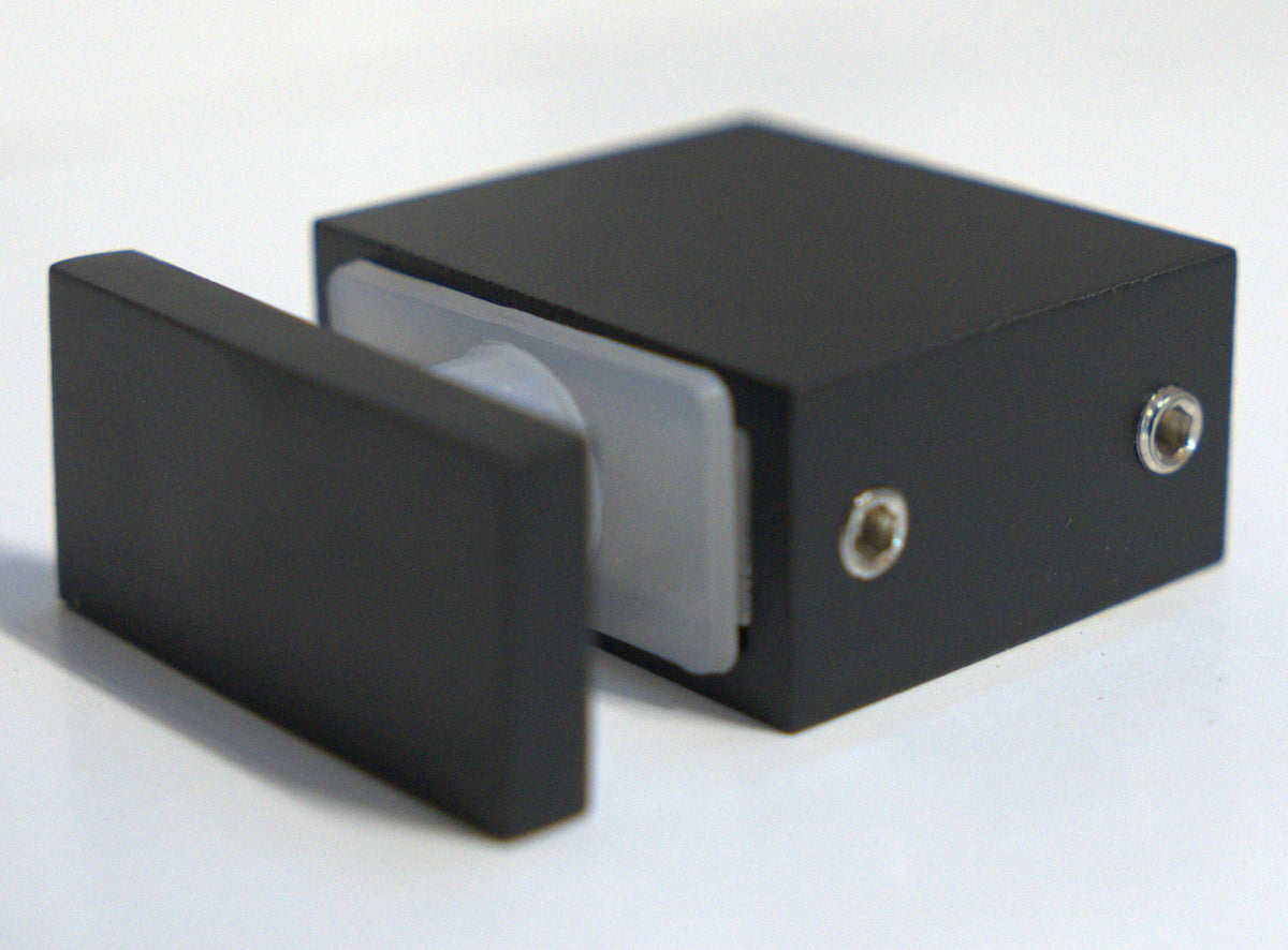 Black roller return panel clamp SQ by Best Glass Parts, showing the sturdy metal construction and sleek finish.