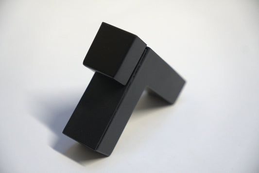 Square showcase shelf bracket from Best Glass Parts, with a tap design, mounted on a display shelf for supporting glass or display panels.