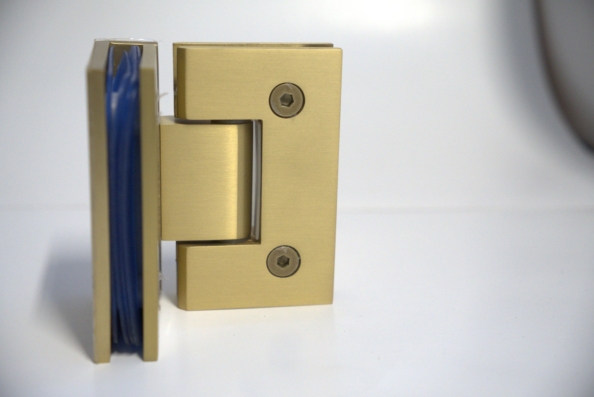 Glass to glass 90-degree hinge for shower doors by Best Glass Parts, showcasing a sturdy metal hinge with mounting plates.