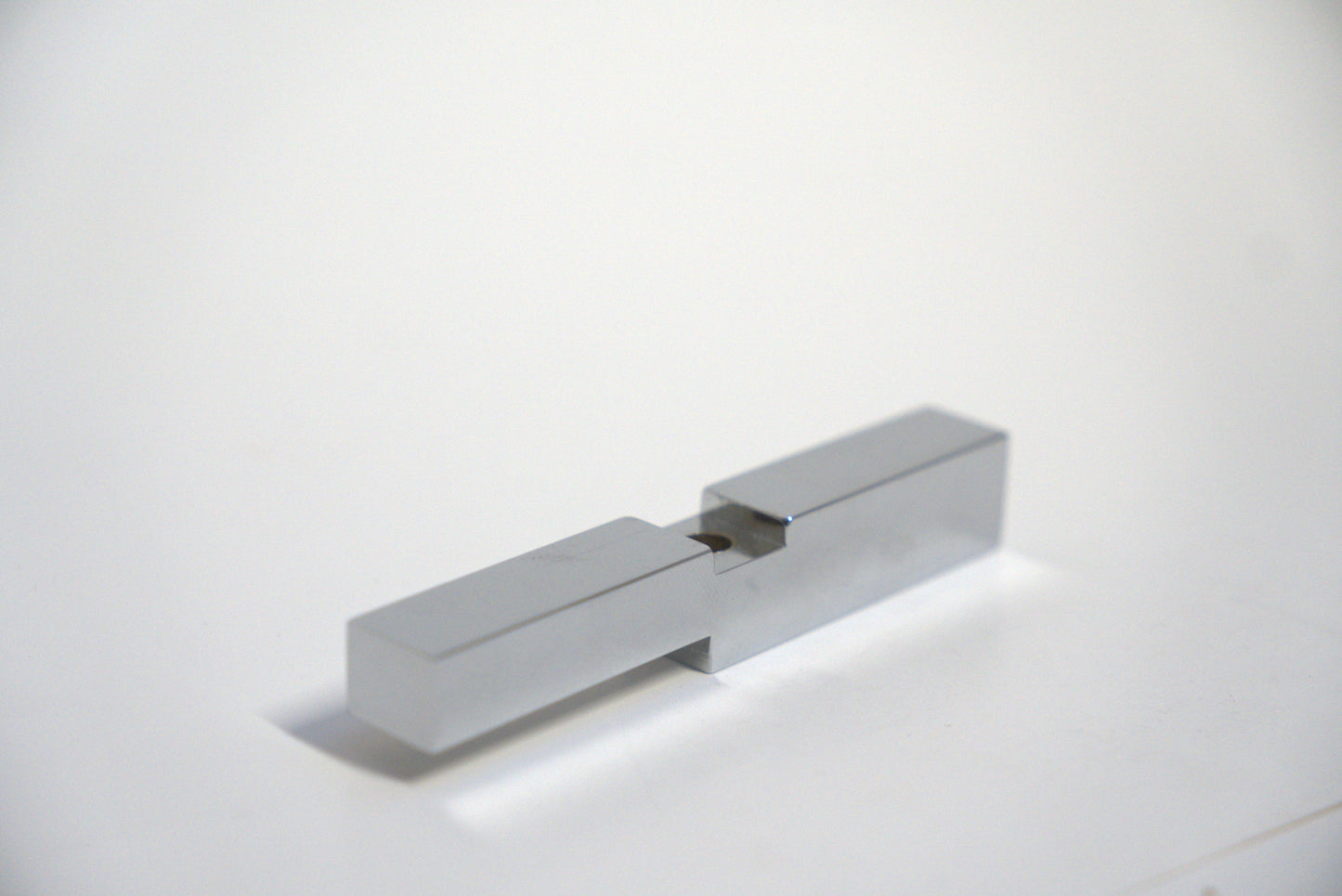 Standard hinge header adapter by Best Glass Parts, showing a metallic component used in glass door installations.