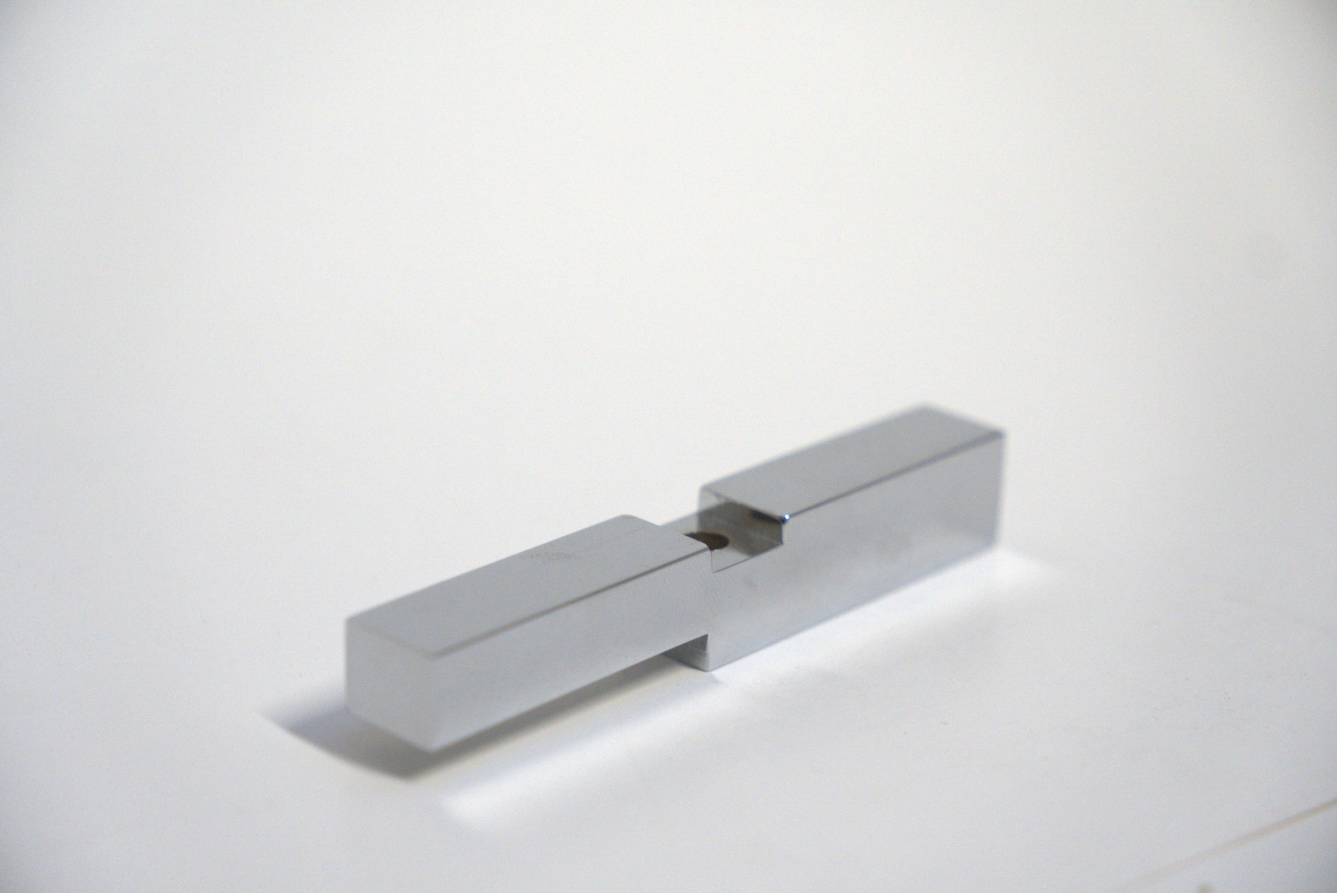 Standard hinge header adapter by Best Glass Parts, showing a metallic component used in glass door installations.