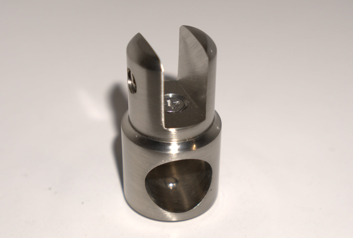 Support bar clamp for glass to rod, half-open design, by Best Glass Parts, shown holding glass securely in place.