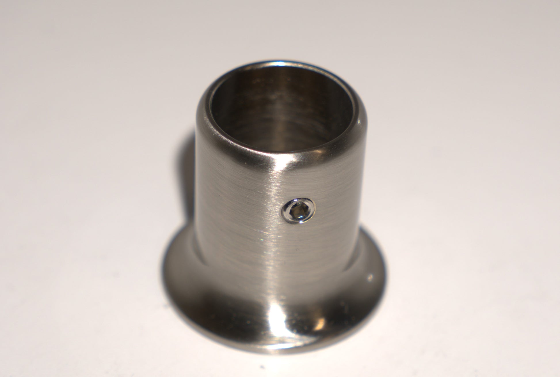 Bronze support bar flange for wall-mounted rod from Best Glass Parts, shown with mounting hardware and wall attachment.