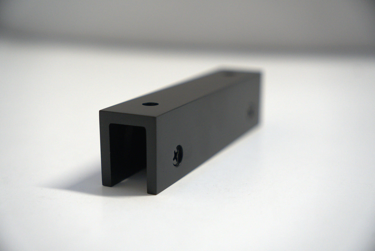 Top Clamp 180 from Best Glass Parts, showcasing a sturdy glass clamp with a sleek metal finish for secure glass installation.