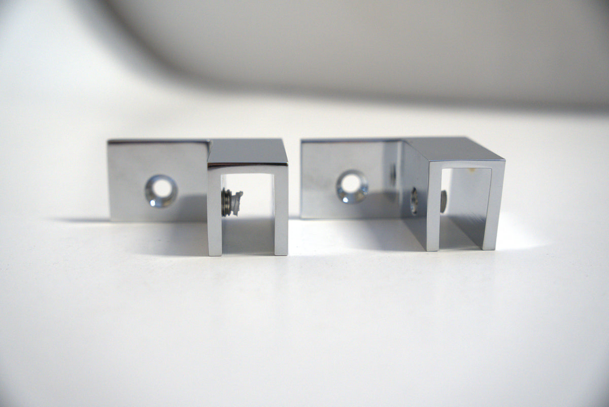 Left-facing Top Clamp 90 from Best Glass Parts, designed for secure glass panel support, shown in the image.