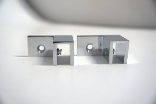 Left-facing Top Clamp 90 from Best Glass Parts, designed for secure glass panel support, shown in the image.
