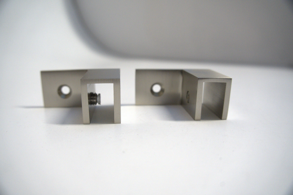 Left-facing Top Clamp 90 from Best Glass Parts, showcasing its durable metal construction and mounting features.