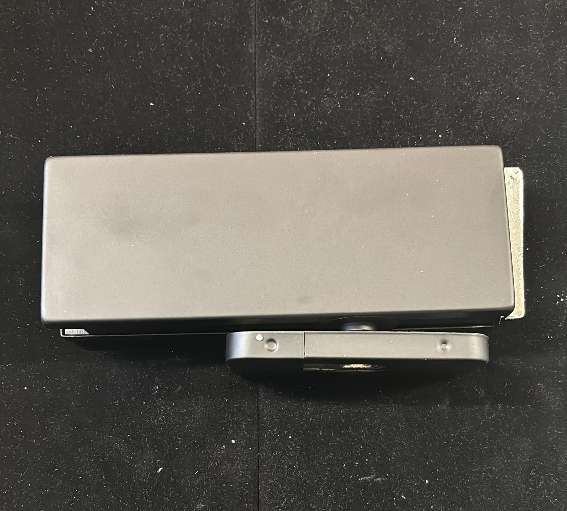 Brushed nickel bottom floor hinge by Best Glass Parts, showing a sturdy metal hinge with mounting screws for glass doors.