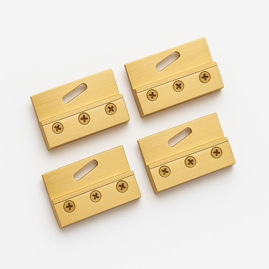 Set of four gold glass clamps by Best Glass Parts, sturdy hardware for securing glass panels in modern installations.