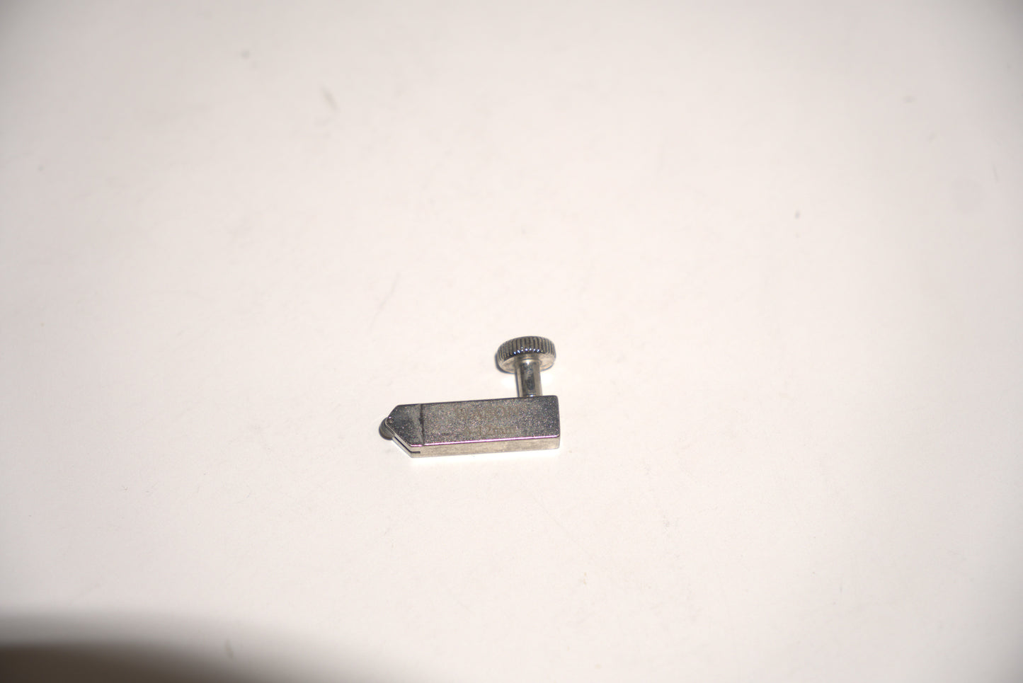 Small glass cutter replacement by Best Glass Parts, showing the compact cutting tool with a metal wheel for precise glass scoring.